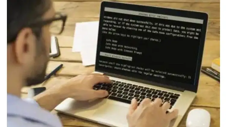 Menggunakan System Restore